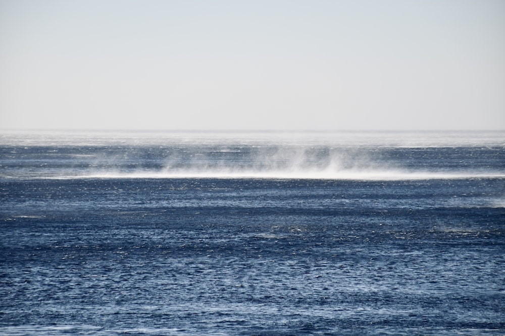 a body of water with waves