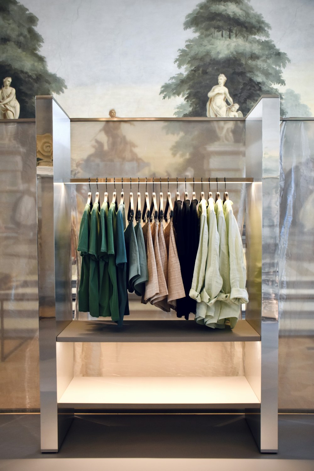 a display case with clothes