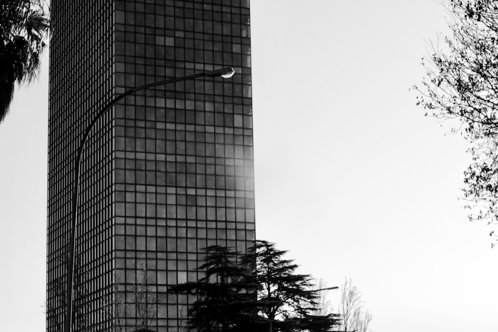 a tall building with a street light