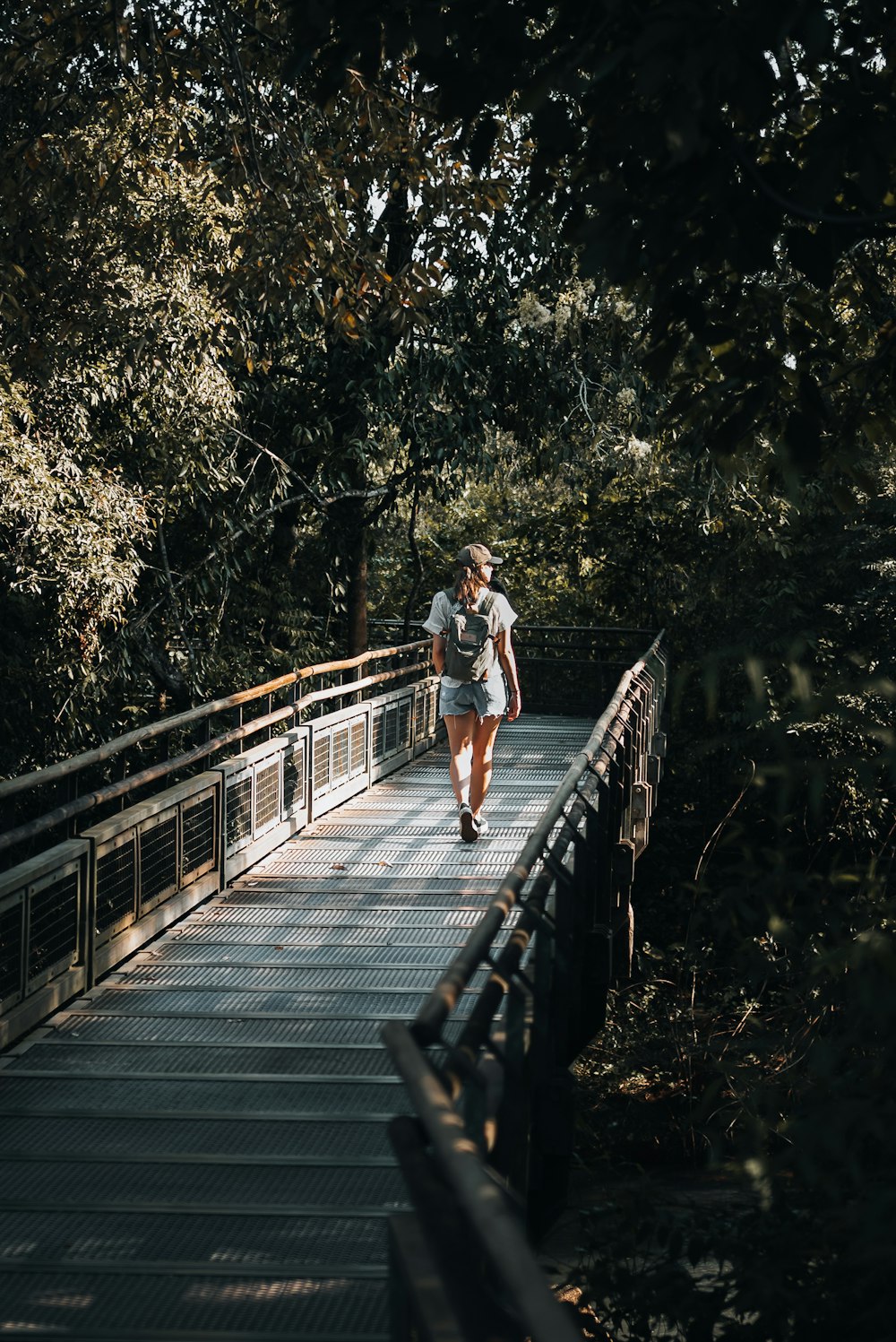 a person walking on a bridge