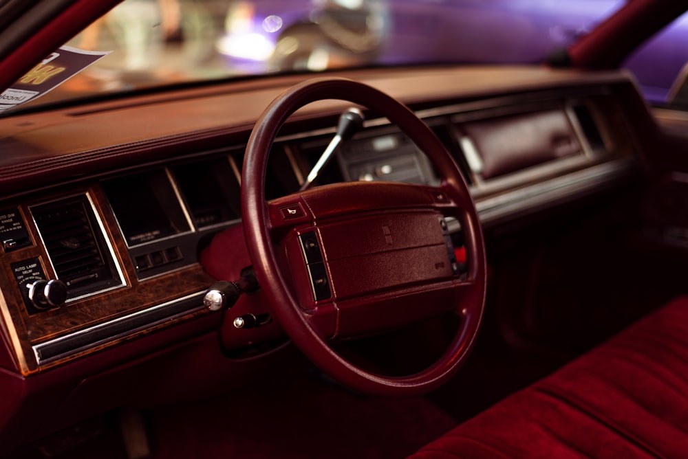 a steering wheel and dashboard of a car