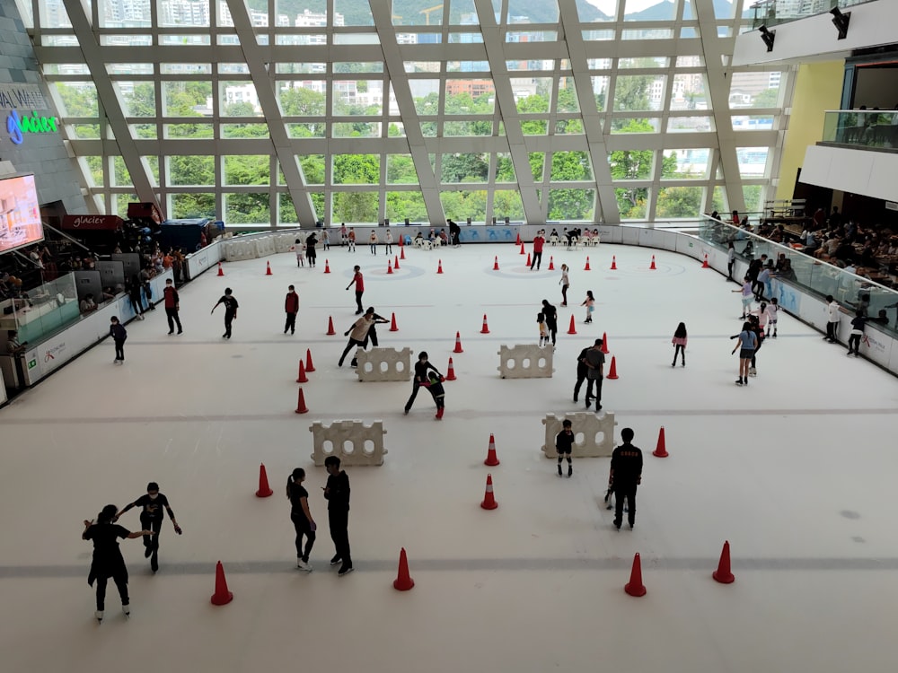 a group of people in an ice rink