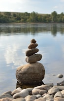 a group of rocks in a body of water