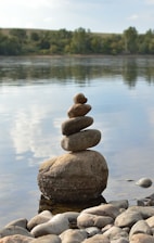a group of rocks in a body of water