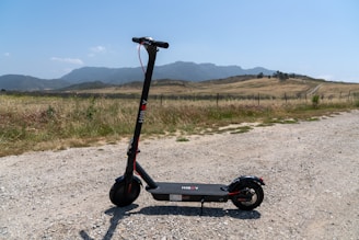 a lawn mower on a dirt road