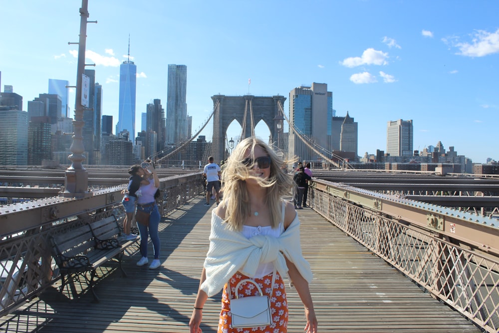 a person standing on a bridge