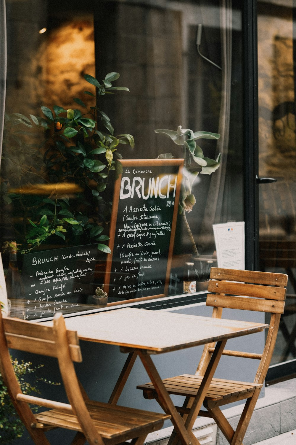 a table with chairs and a sign