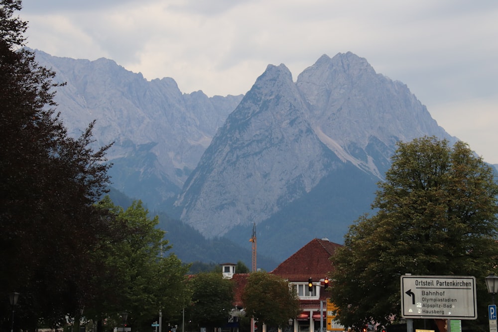 a building with a mountain in the background