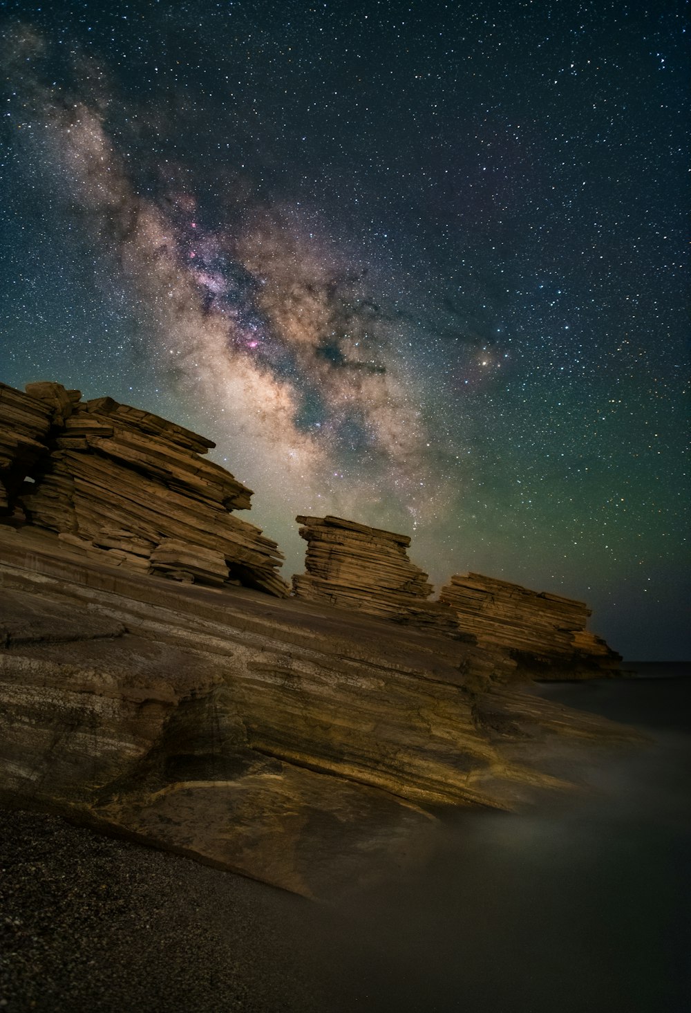 a pyramid with stars in the sky