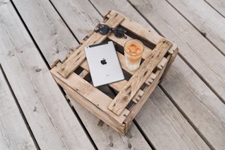Close-up of a coolzy product package on a wooden table with natural light.