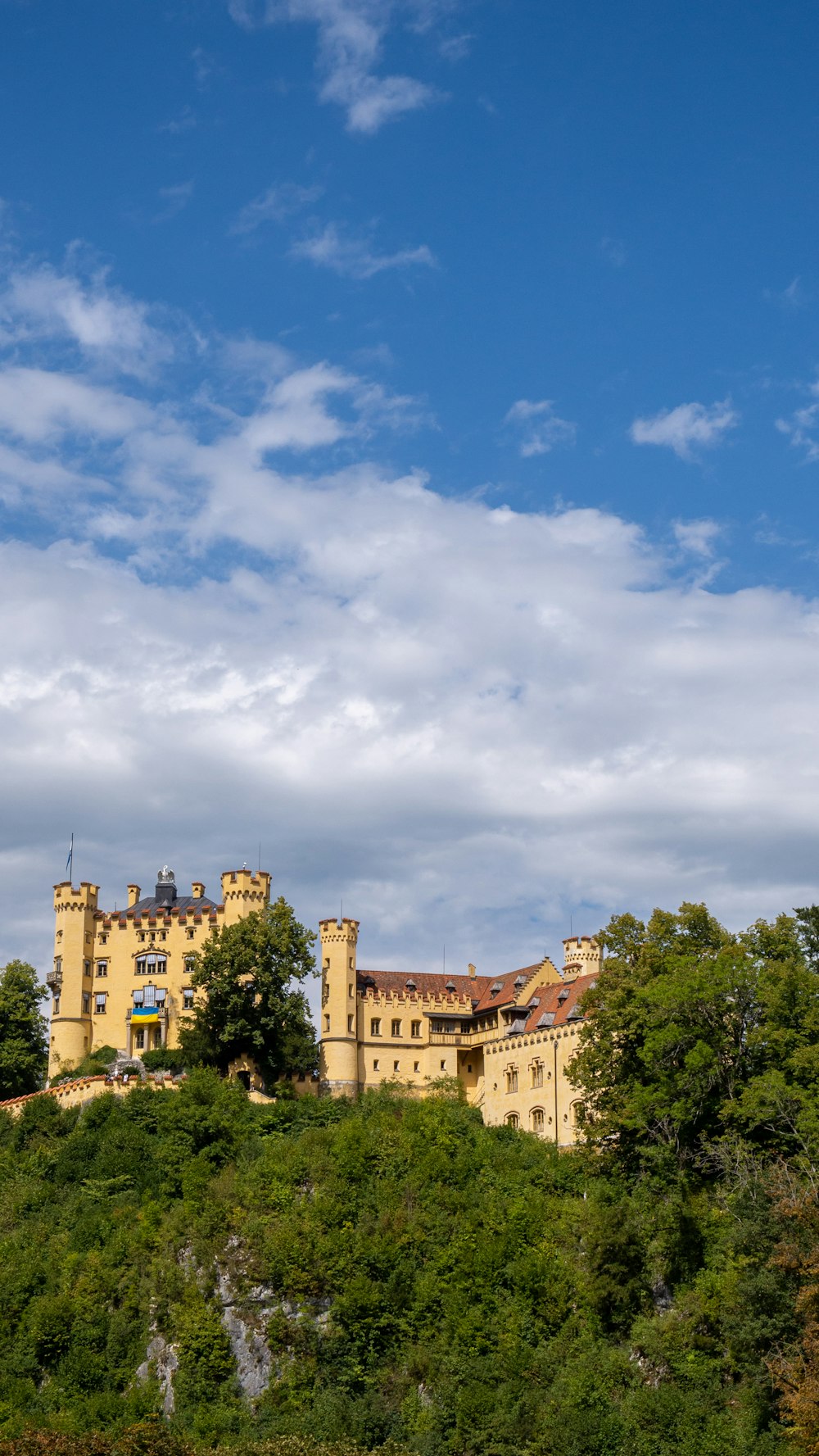 a large building on a hill