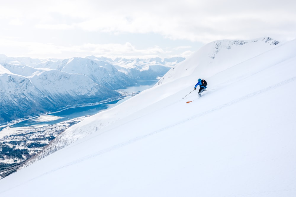 a person skiing down a mountain