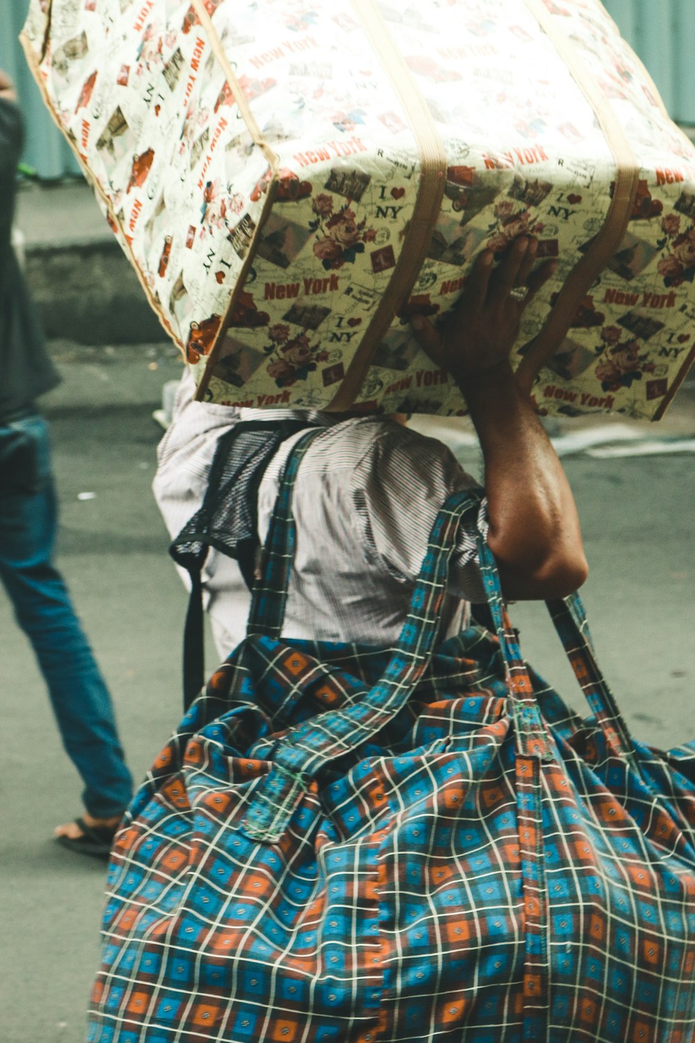 a person carrying an umbrella