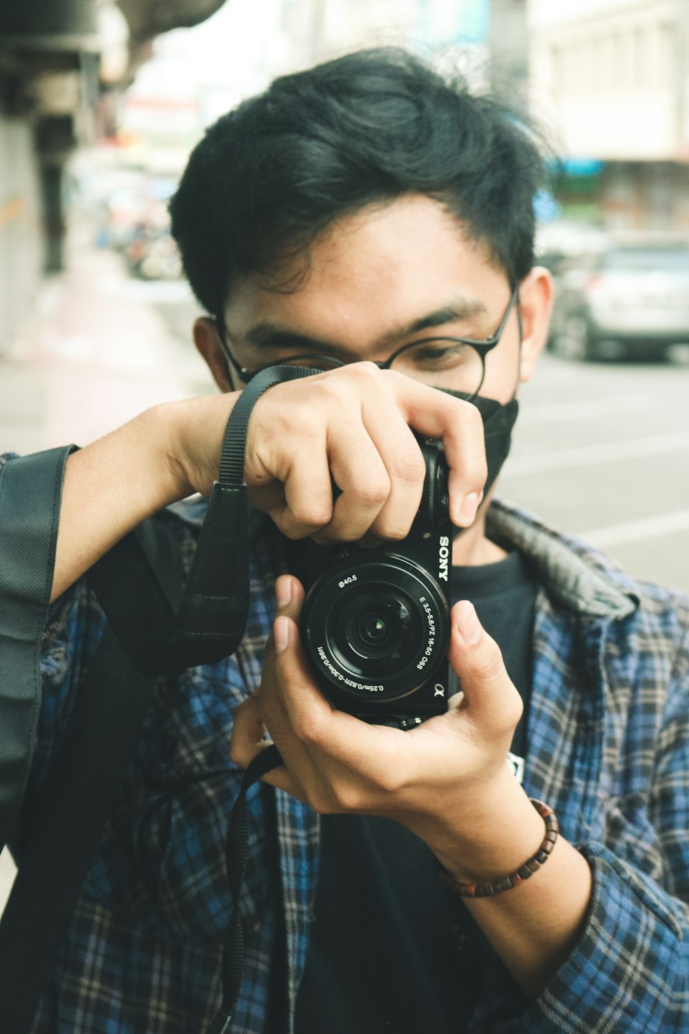 a man holding a camera