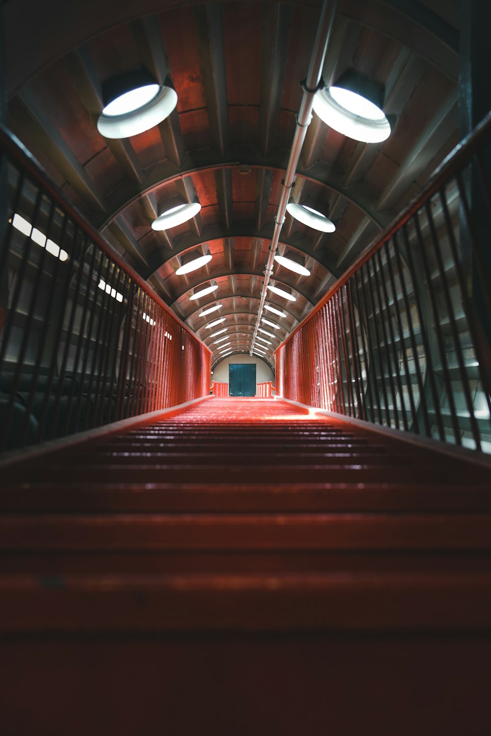 a staircase with red lights