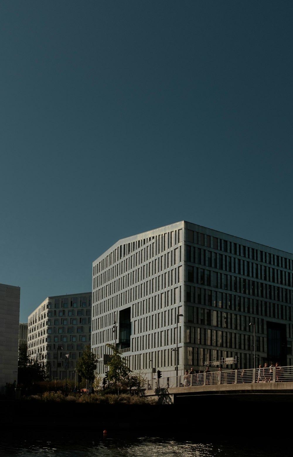 a building with a body of water in front of it