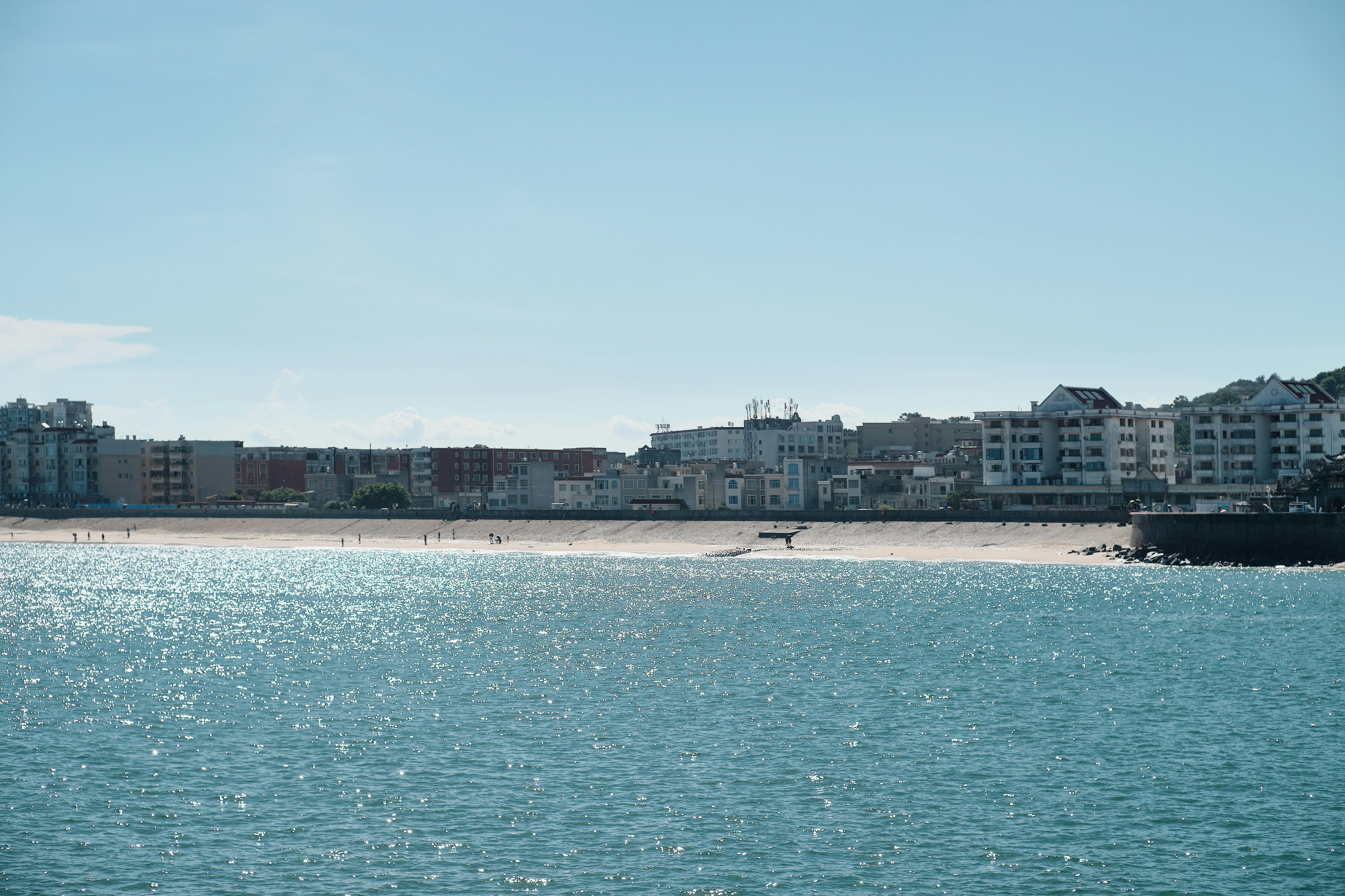 a body of water with buildings along it