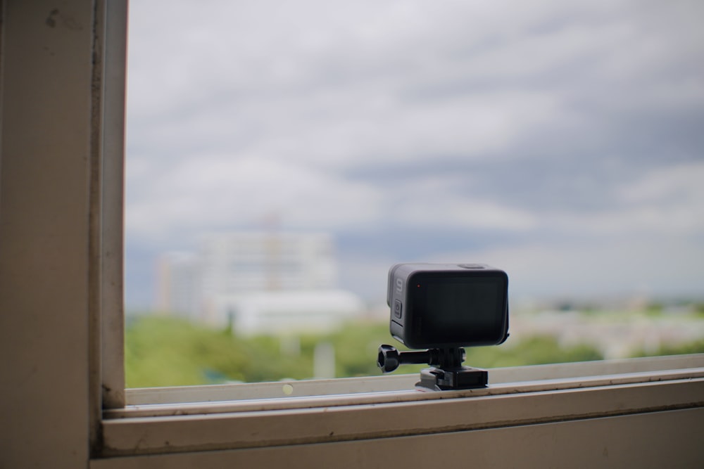 a television on a window sill