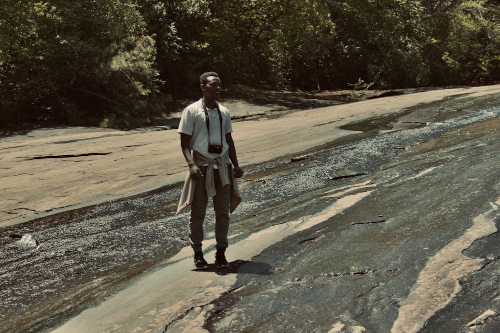 a man walking on a road