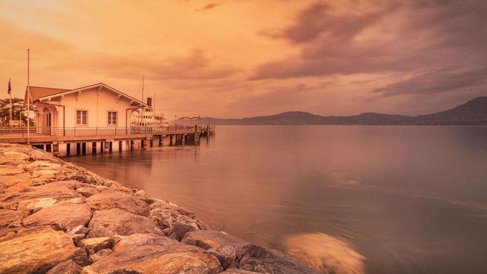 a house on a dock over water