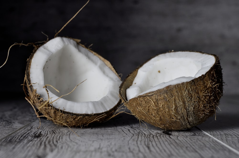 a coconut with a white substance on it