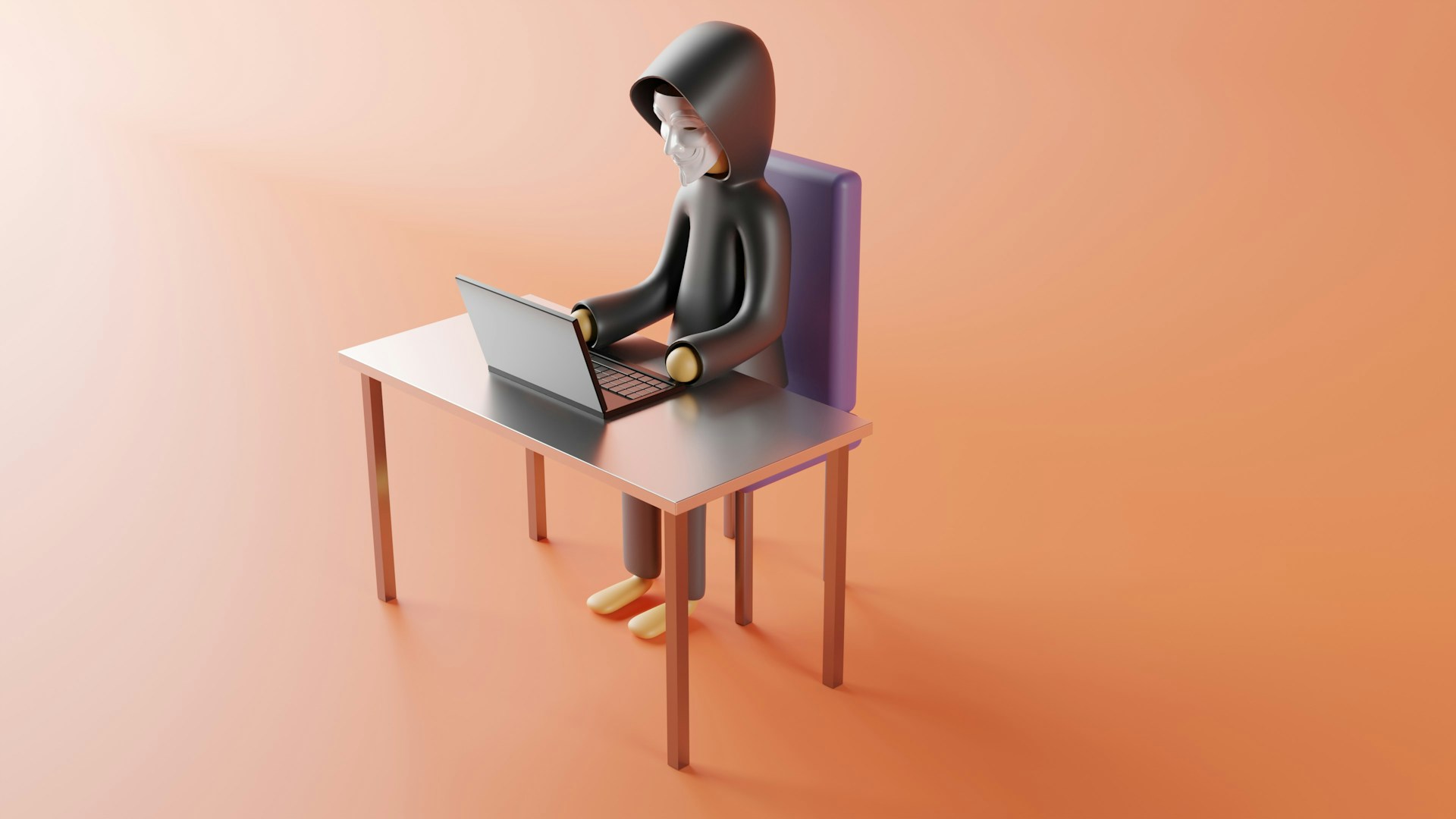 a person sitting at a desk with a laptop on it