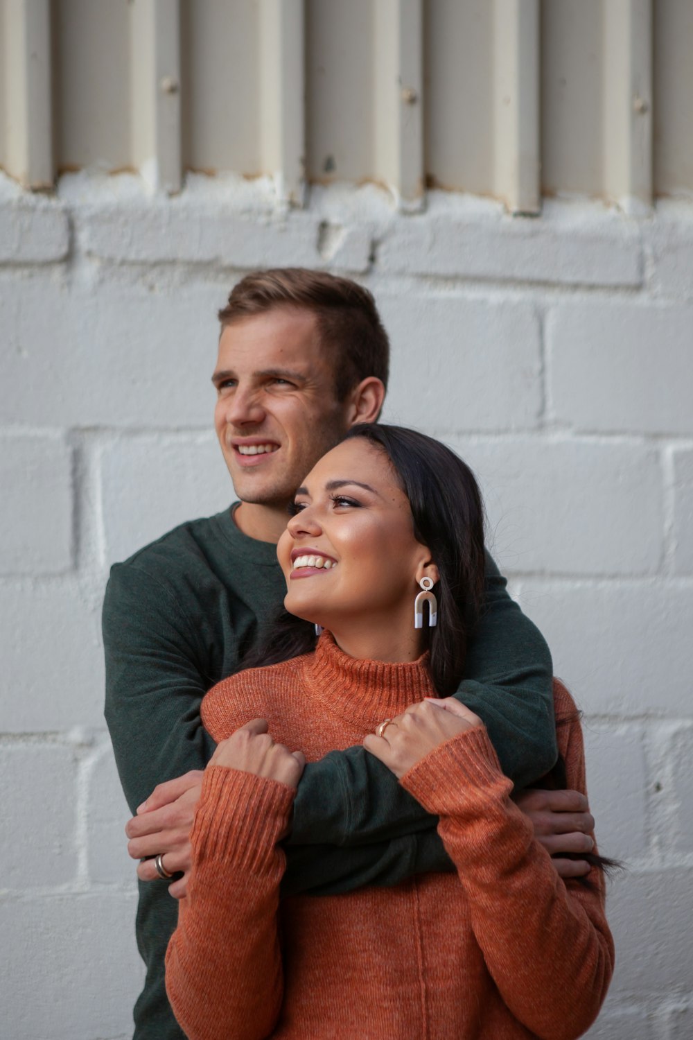 a man and woman hugging