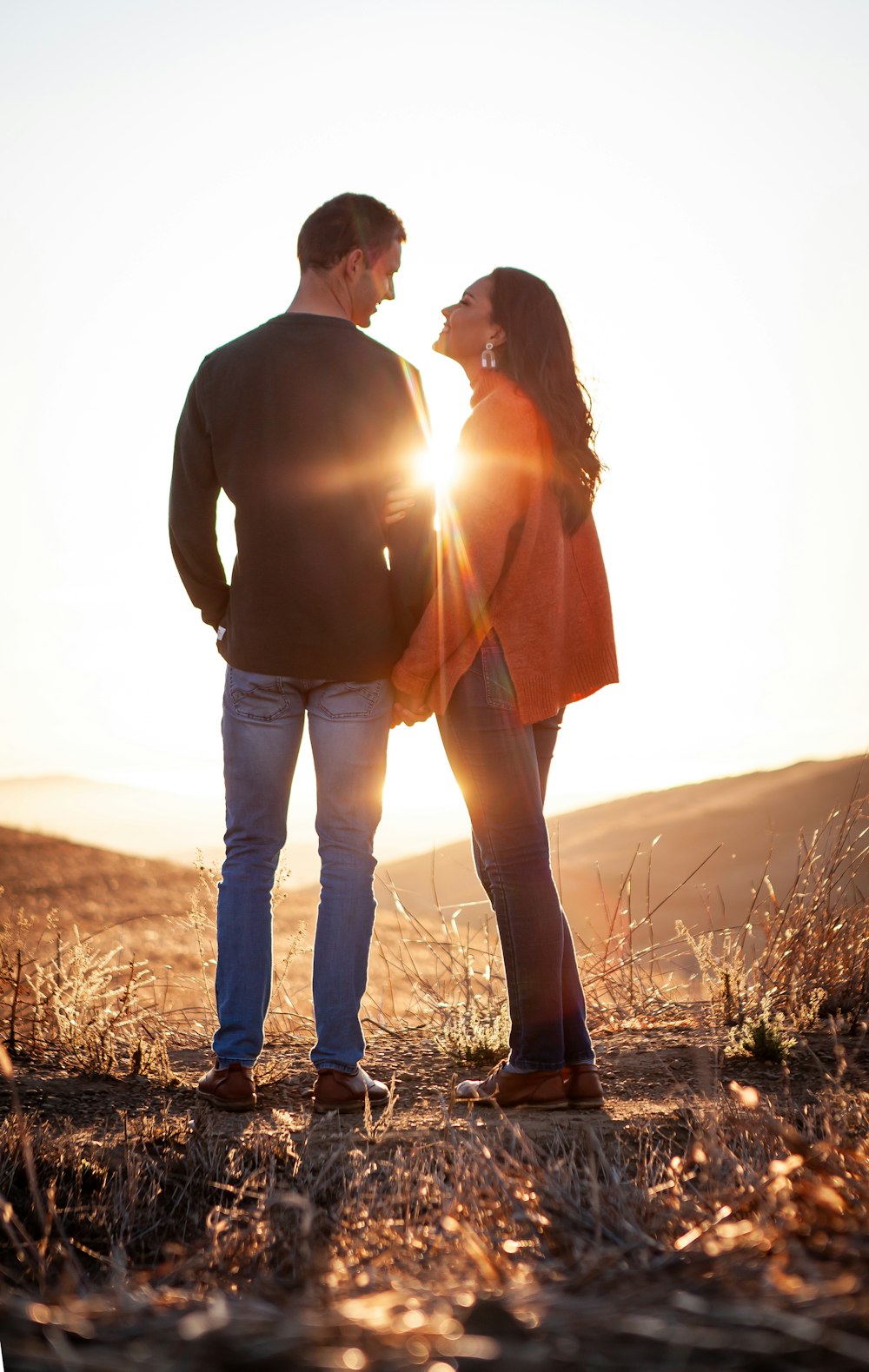 a man and woman kissing