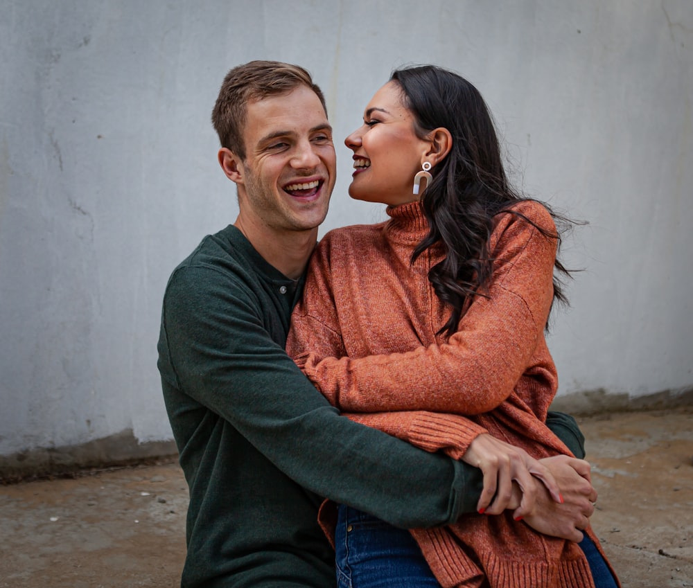 a man and woman hugging