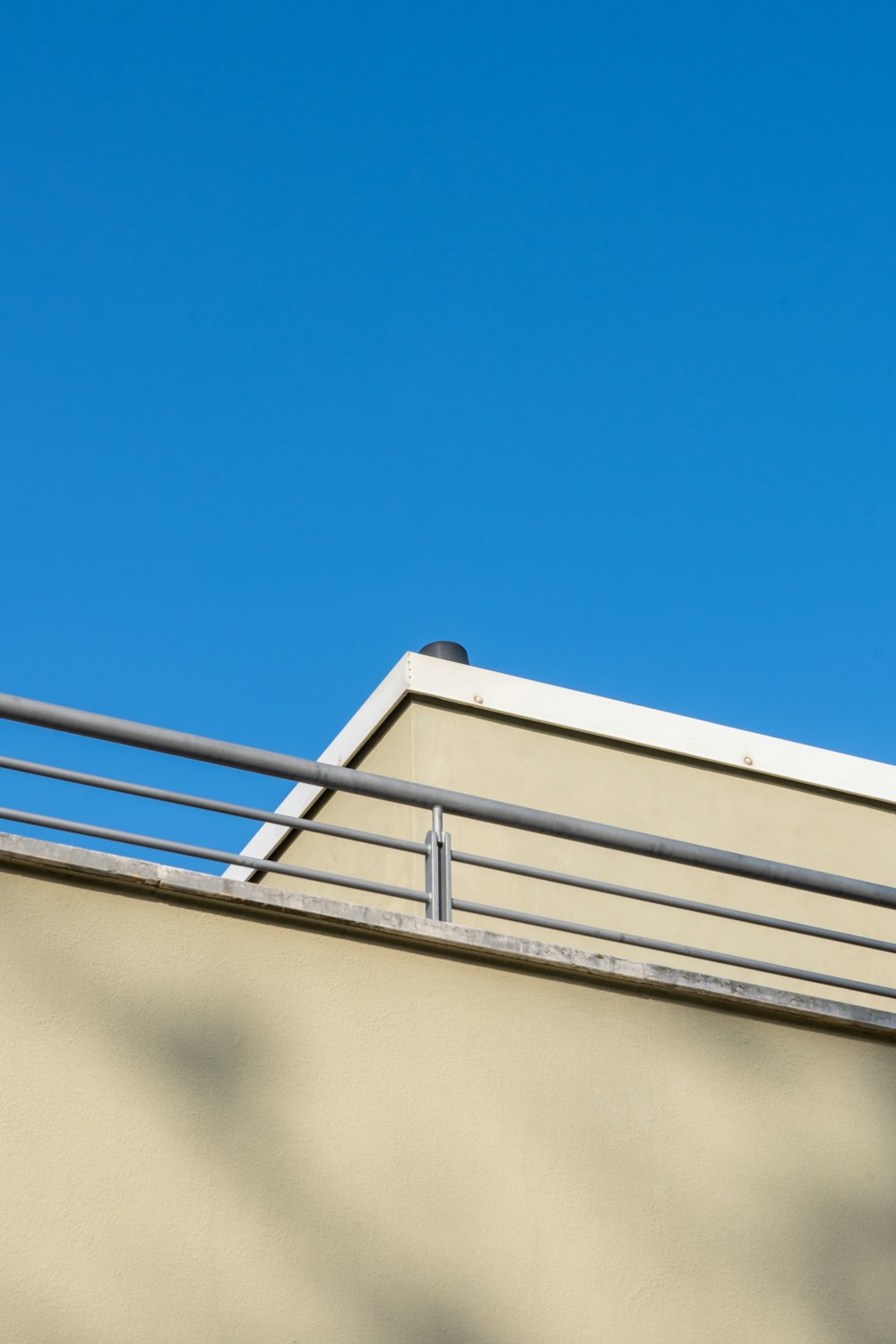 a roof with a metal railing