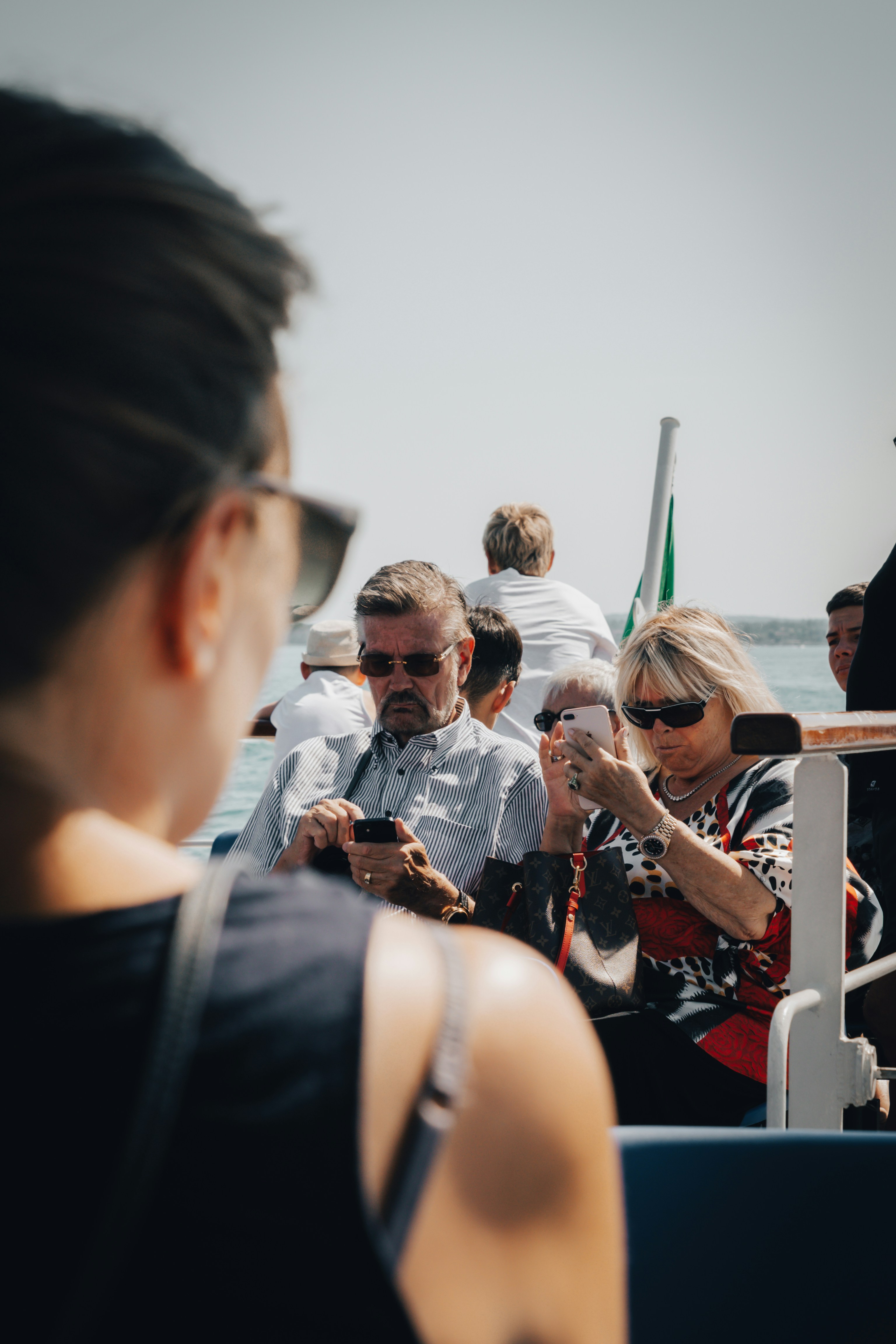 a group of people sitting on a bus