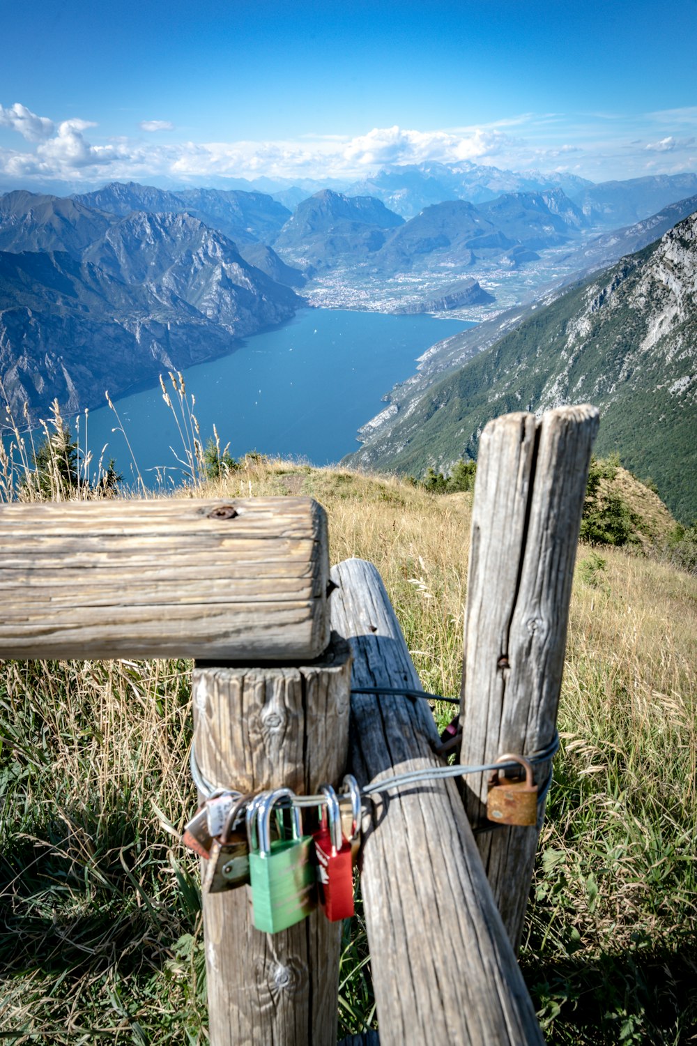 a wooden fence overlooking a lake