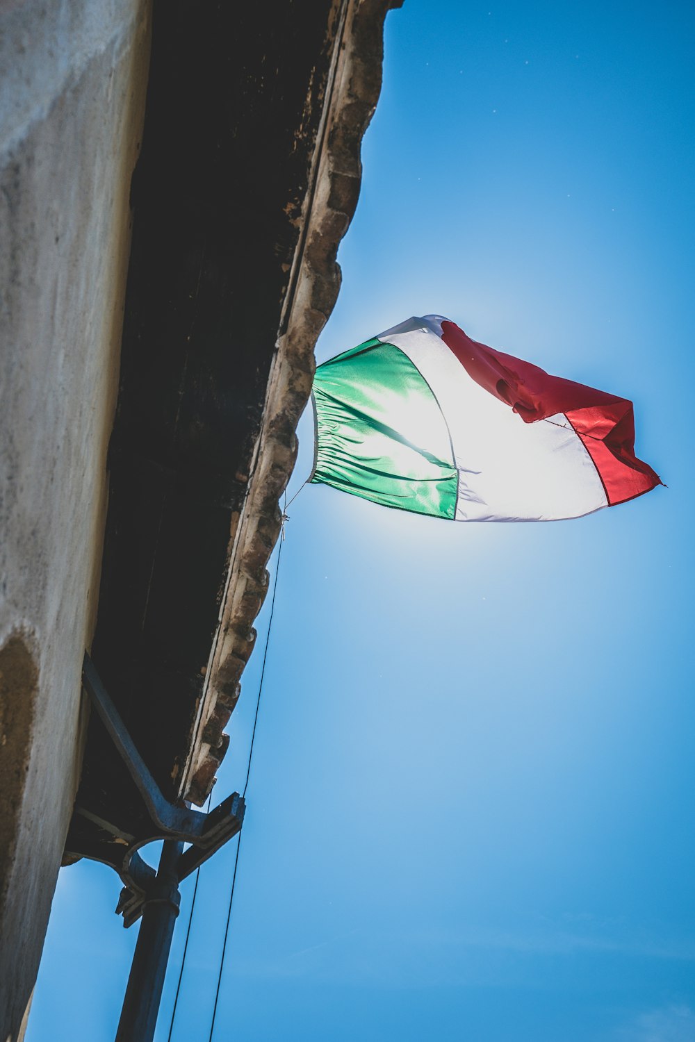 a flag flying on a pole