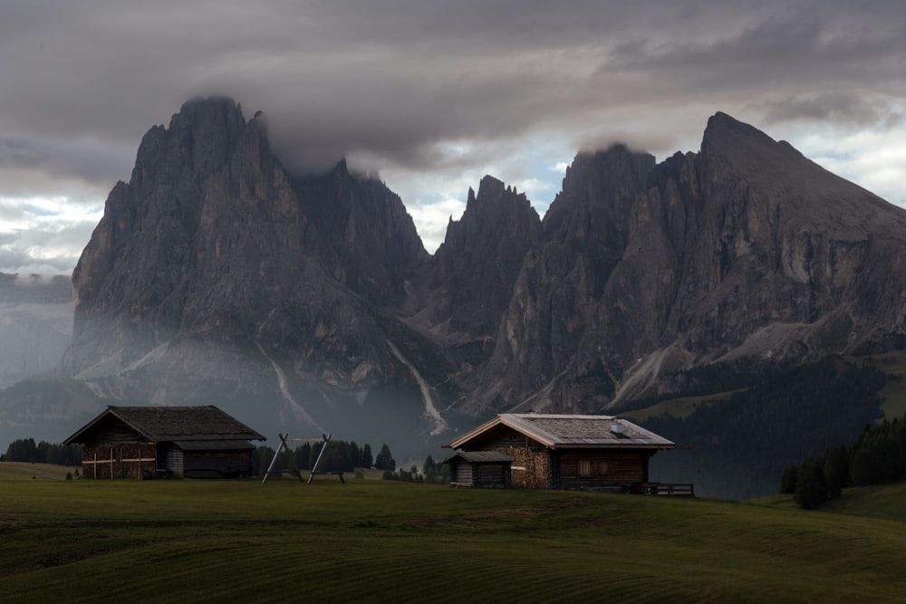 a house in front of a mountain