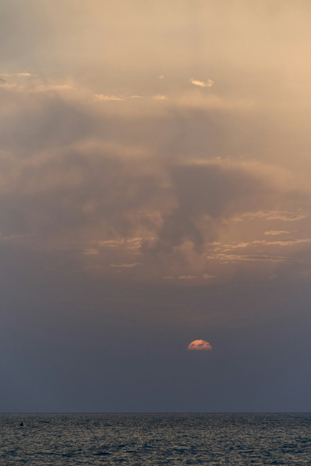 a sunset over a body of water