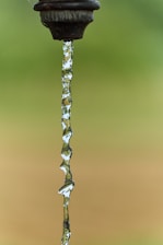 Clean water from a tap, representing wells and septic systems at cottages.
