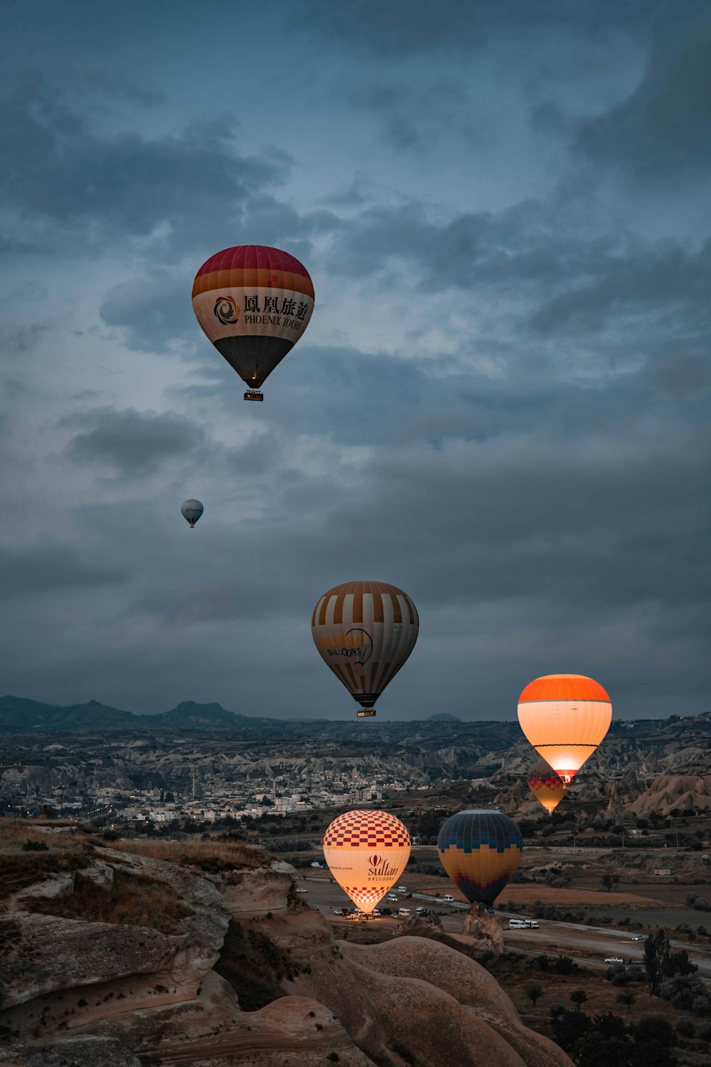 a group of hot air balloons in the sky