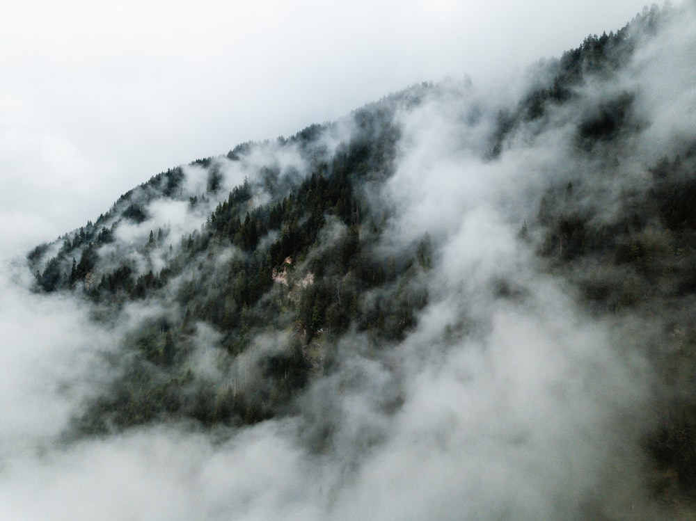 a mountain covered in clouds