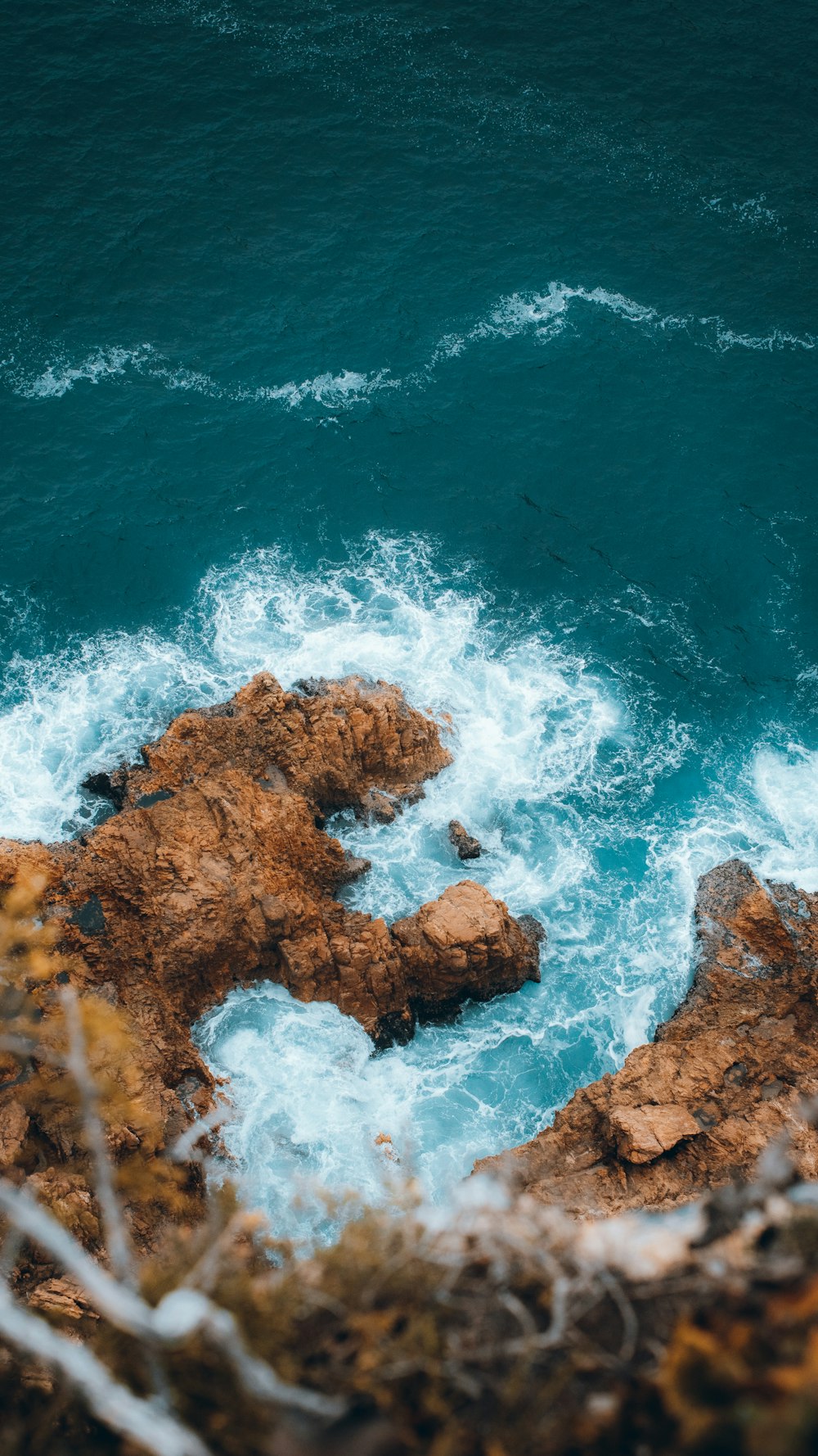 waves crashing on rocks