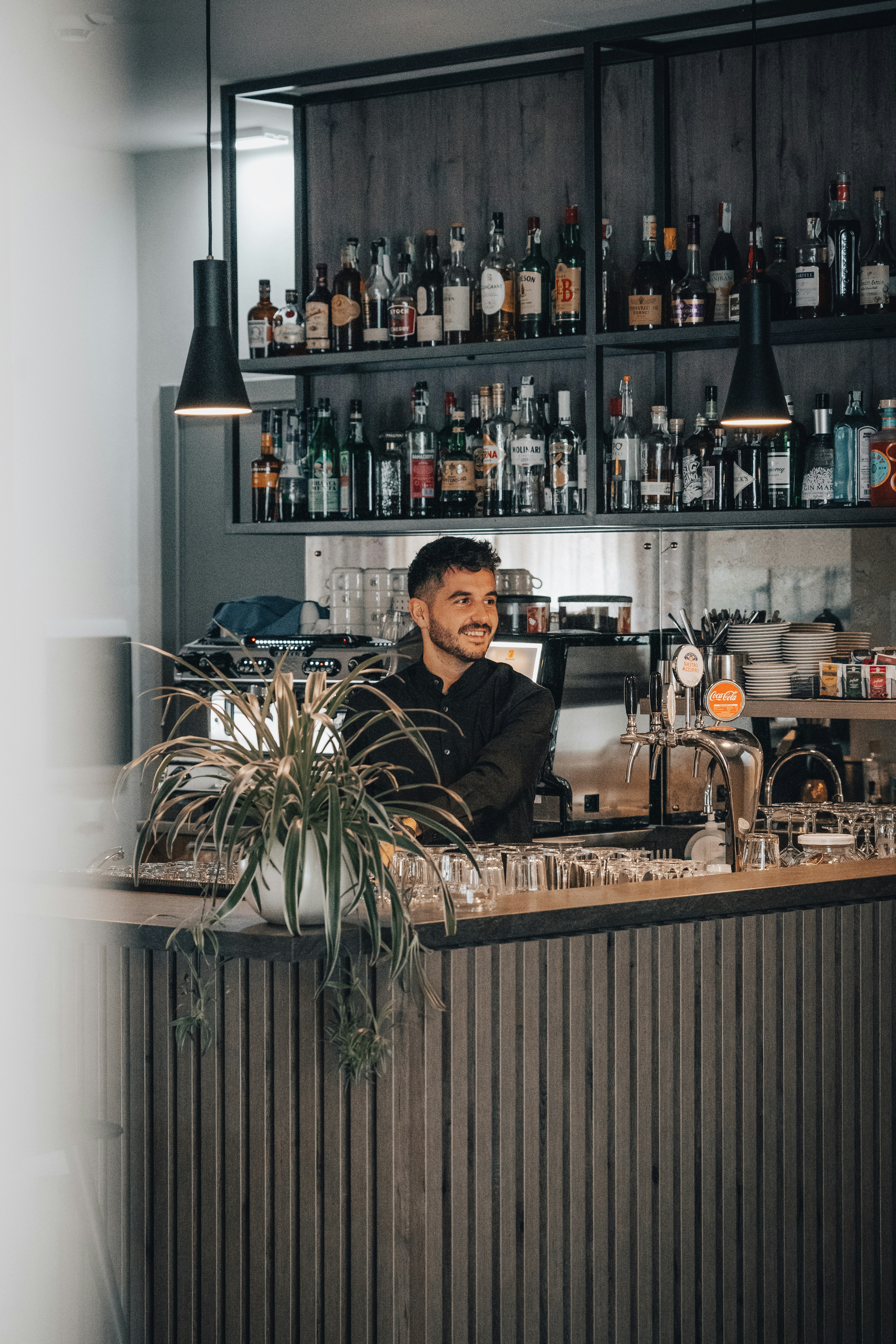 a person sitting at a bar