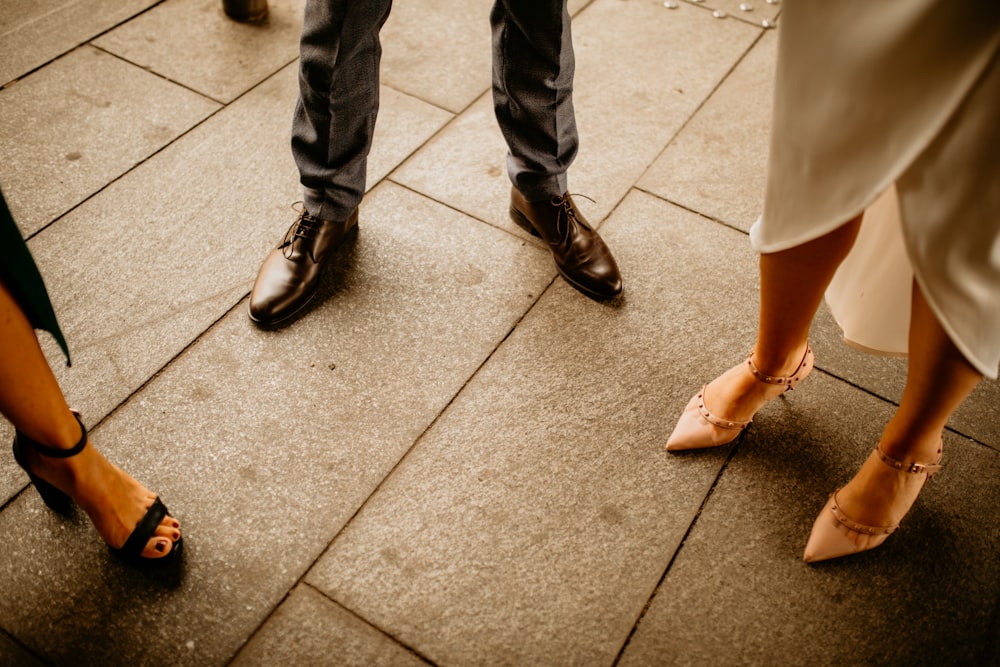 a group of people wearing high heeled shoes