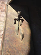 Abstract bronze sculpture with visible marks of molding and catalysis.