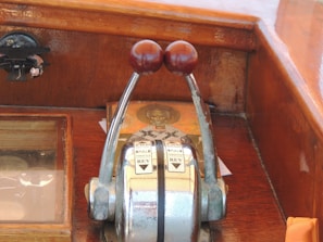 Various throttle designs arranged neatly on a workshop table