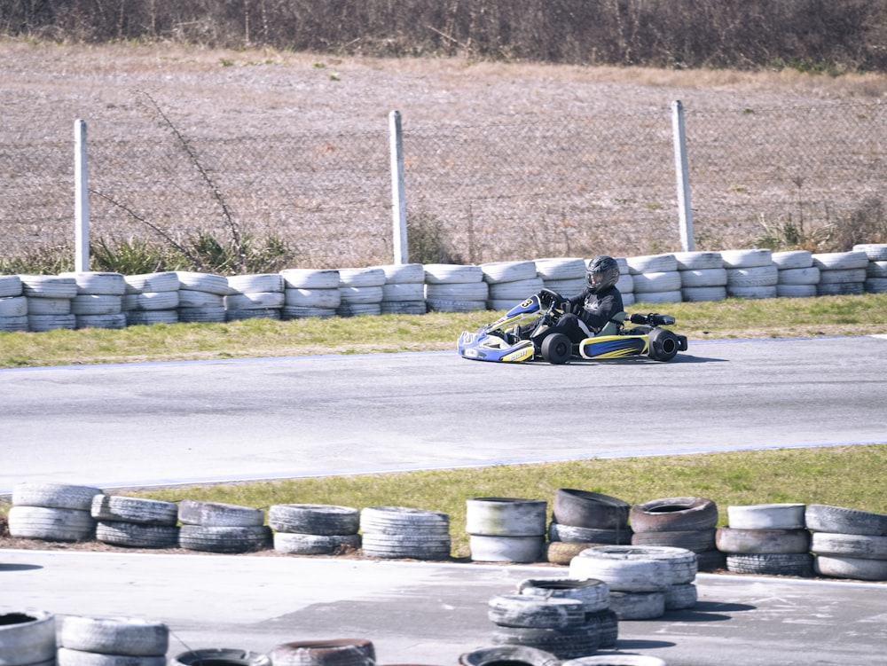 a person driving a go kart