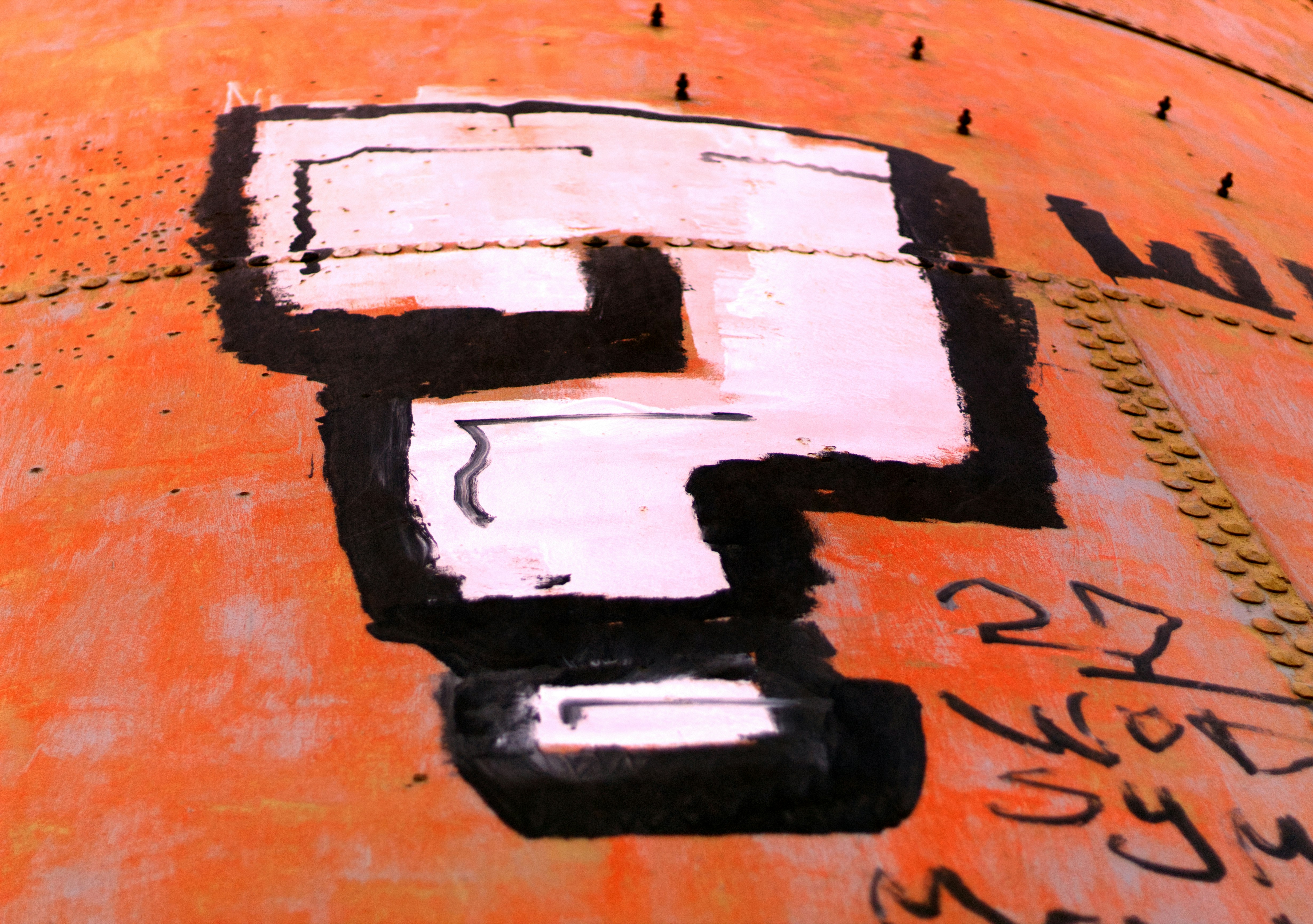 a close-up of a painted wood surface