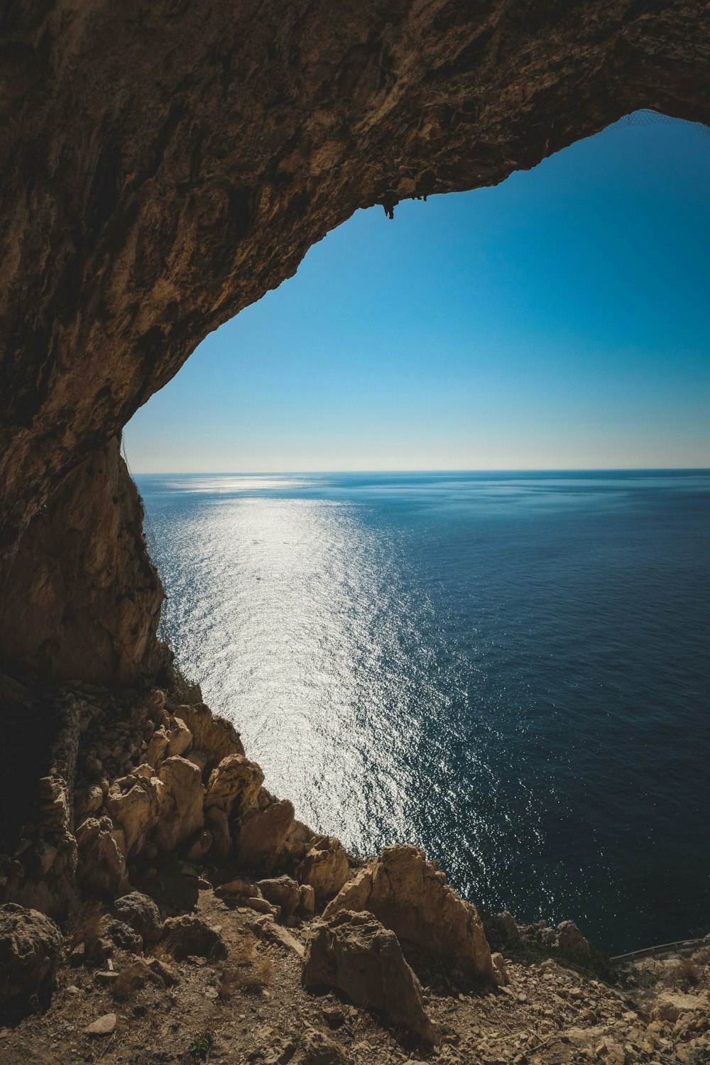 a cave with a body of water in it