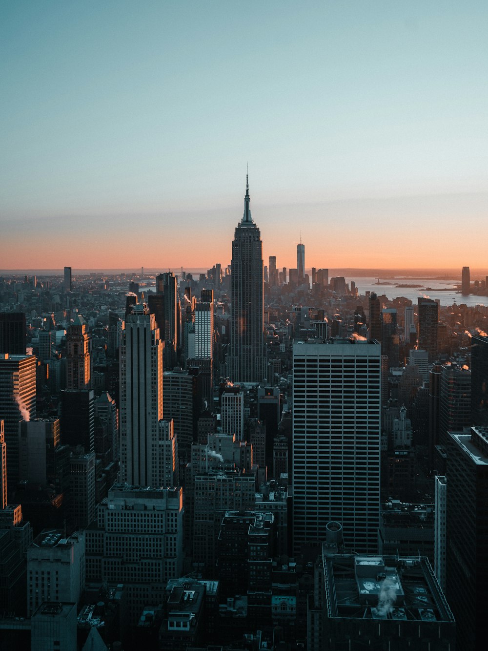 a city skyline at sunset