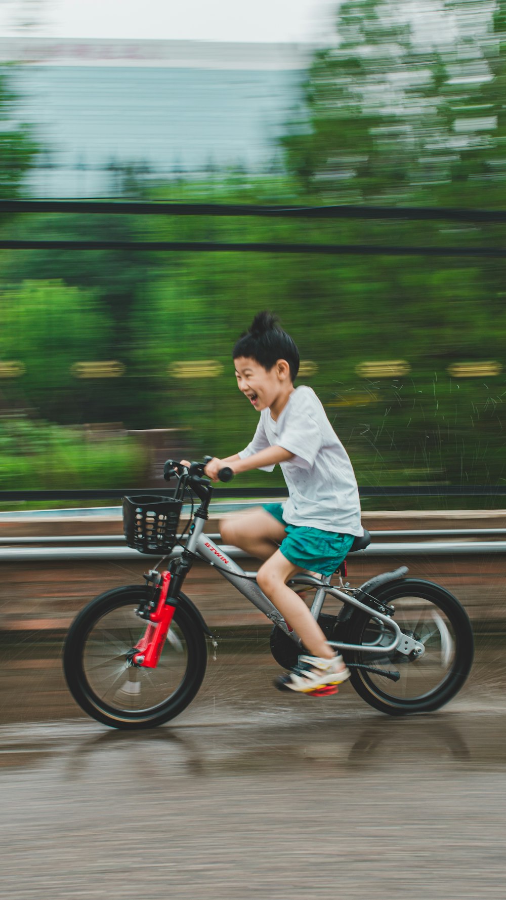a boy riding a bike