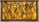 A decorative wall features a geometric patterned background with a warm golden hue. Mounted metal frames hold several small potted plants with lush green foliage, arranged symmetrically. The design blends natural elements with modern art deco style.
