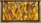 A decorative wall features a geometric patterned background with a warm golden hue. Mounted metal frames hold several small potted plants with lush green foliage, arranged symmetrically. The design blends natural elements with modern art deco style.